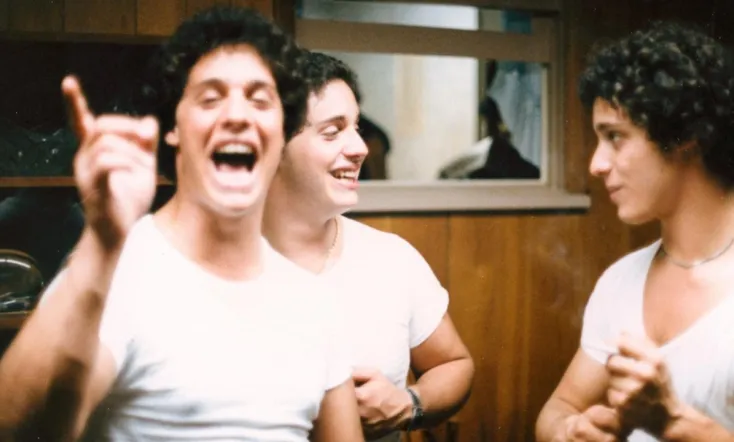 Three Identical Strangers