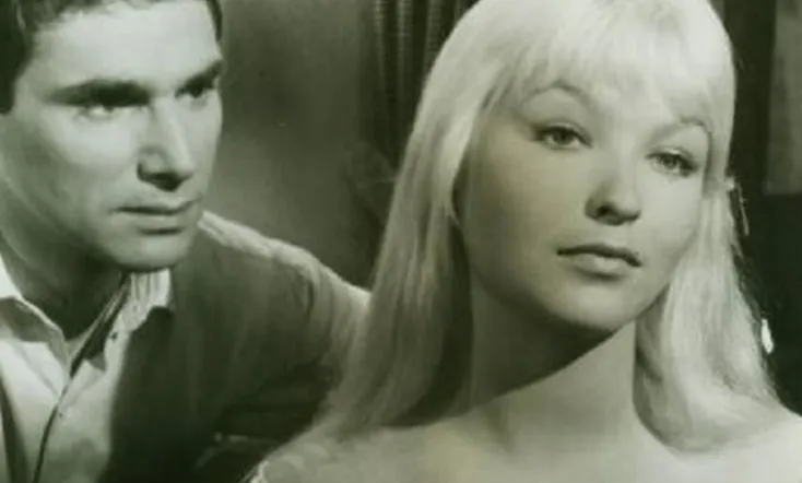 Blonde in a White Car