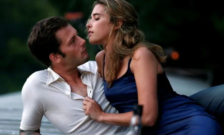 The Blonde with Bare Breasts