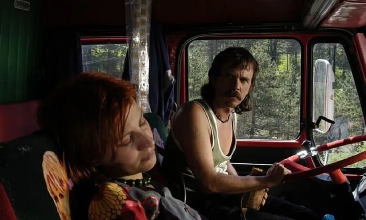 The Red Colored Grey Truck